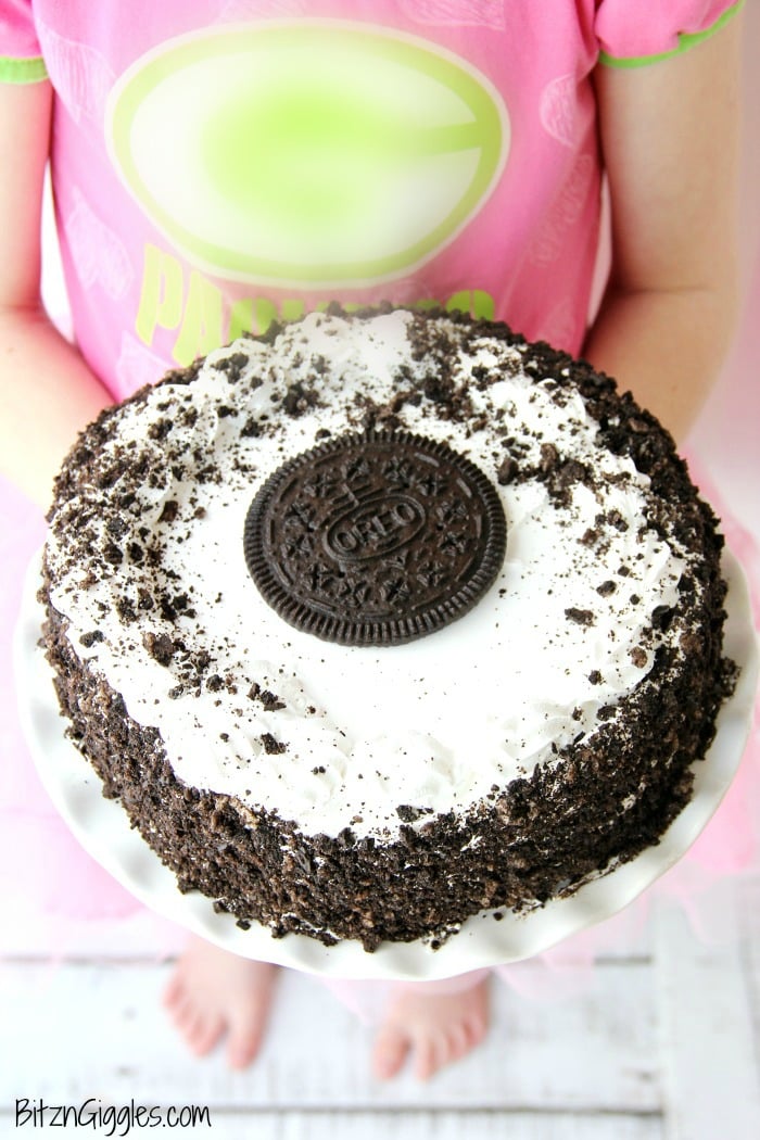 Oreo Ice Cream Cake - A delicious dessert that tastes homemade. Slip onto a cake stand and you're ready to party!