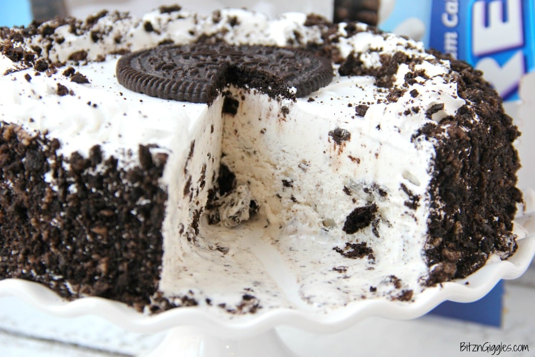 Oreo Ice Cream Cake - A delicious dessert that tastes homemade. Slip onto a cake stand and you're ready to party!