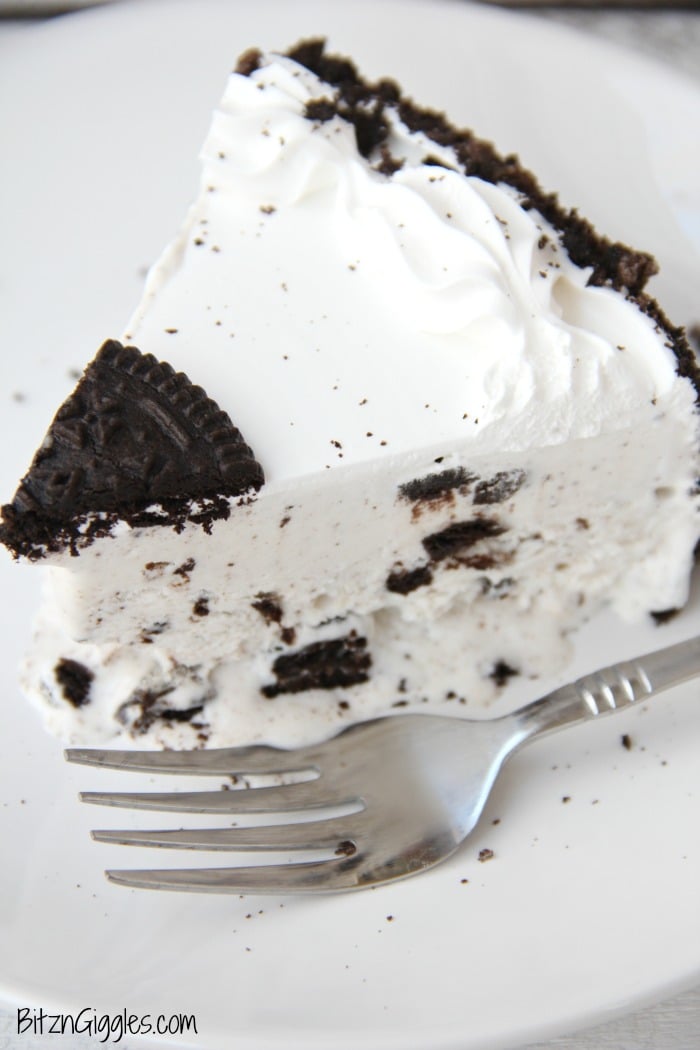 Oreo Ice Cream Cake - A delicious dessert that tastes homemade. Slip onto a cake stand and you're ready to party!