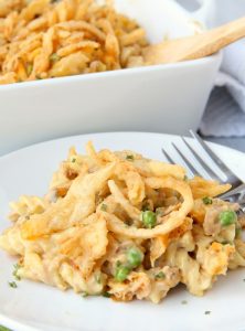 Tuna Noodle Casserole - Pasta and tuna in a creamy sauce topped with cheese and french fried onions! The perfect casserole for busy weeknights!