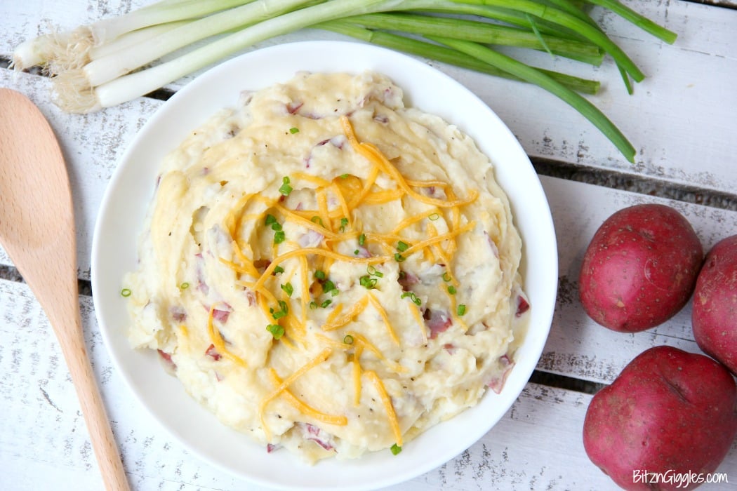 Twice Baked Red Potato Casserole - Flavorful mashed potatoes you bake right in the oven!! Perfect for a crowd!