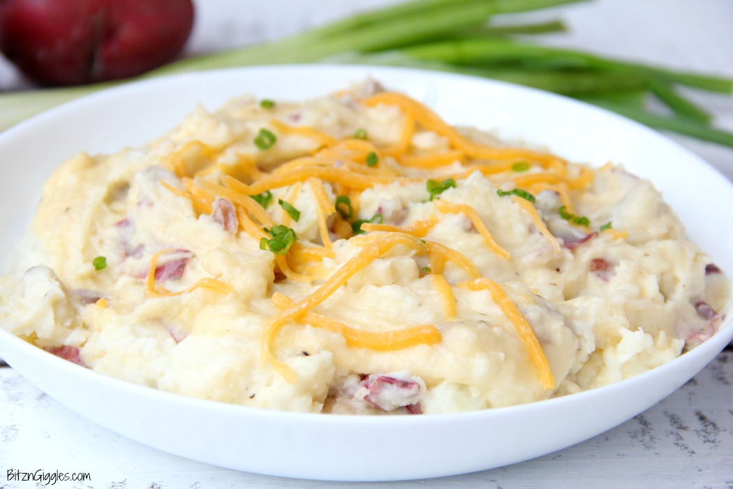 Twice Baked Red Potato Casserole - Flavorful mashed potatoes you bake right in the oven!! Perfect for a crowd!