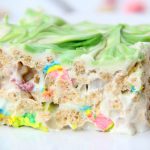 Microwave Lucky Charms Treats - Ooey, gooey, marshmallowy treats made with Lucky Charms then topped with a candy melt swirl!