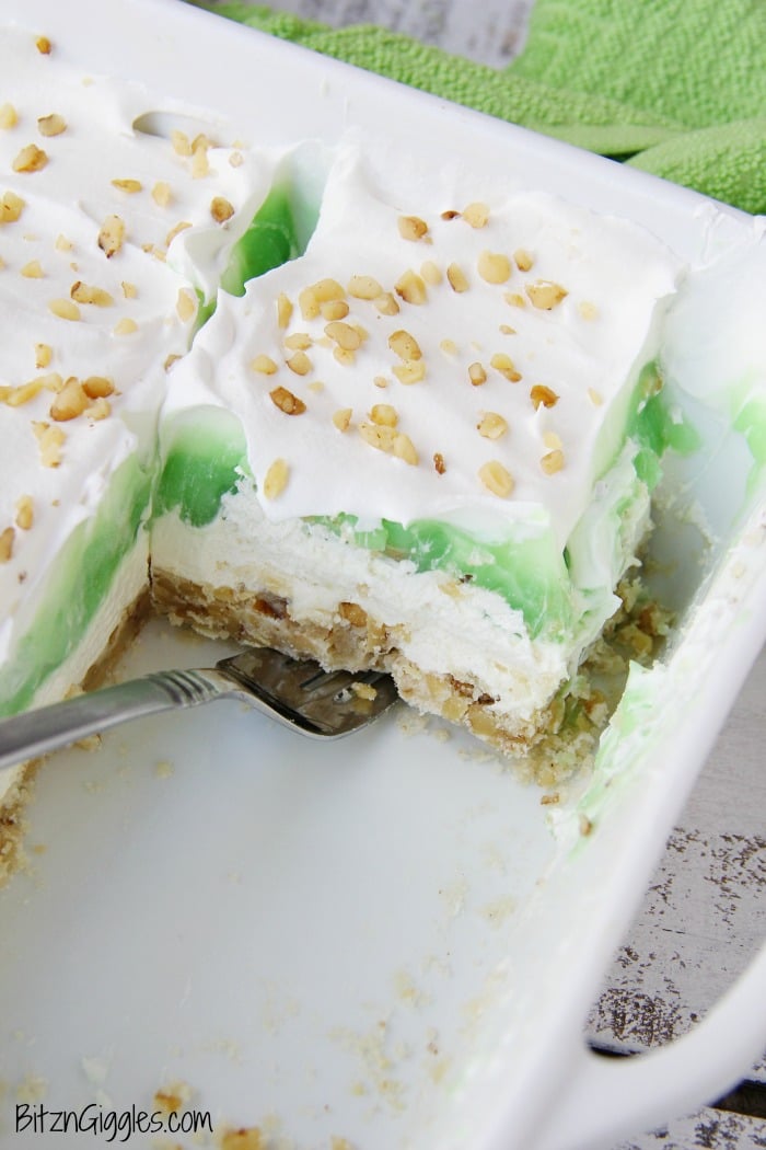 Pistachio Pie Bars - Creamy, four-layer bars with a pie-like crust topped with cheesecake and pistachio deliciousness!