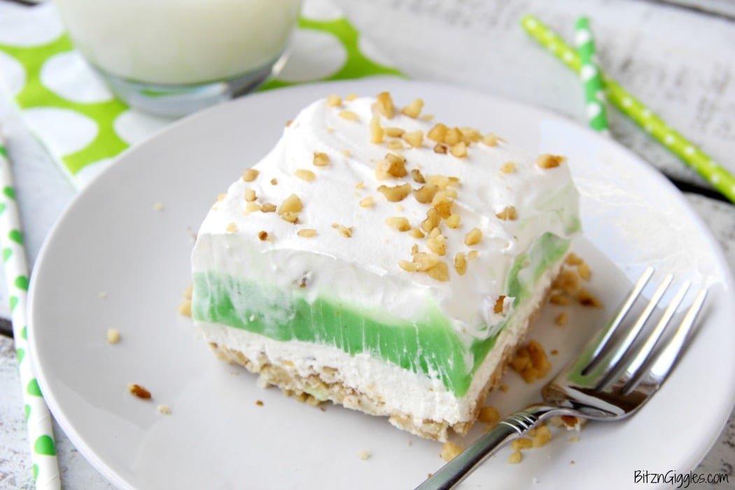 Pistachio Pie Bars - Creamy, four-layer bars with a pie-like crust topped with cheesecake and pistachio deliciousness!