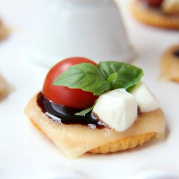 Ritz Cracker Caprese Bites - A 5-ingredient appetizer that's fresh, light and perfect for a party or celebration!