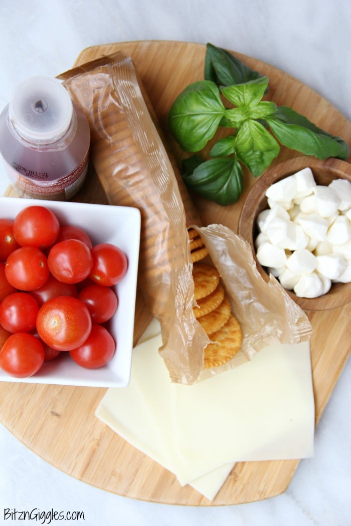 Ritz Cracker Caprese Bites - A 5-ingredient appetizer that's fresh, light and perfect for a party or celebration!