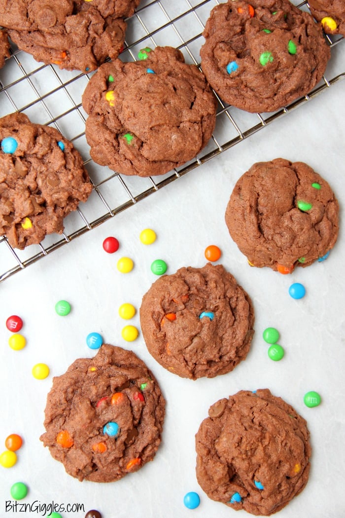 Triple Chocolate Pudding Cookies - Chewy, chocolaty, candy-filled cookies that use pudding as a secret ingredient to keep them nice and soft!