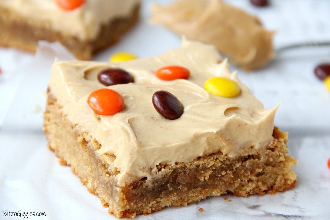 Peanut Butter Brownies - For the peanut butter lovers! Moist, cake-like peanut butter brownies topped with light and fluffy peanut butter frosting!