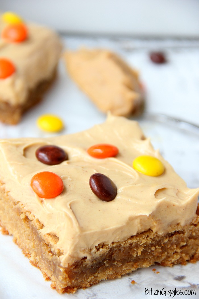 Peanut Butter Brownies - For the peanut butter lovers! Moist, cake-like peanut butter brownies topped with light and fluffy peanut butter frosting!
