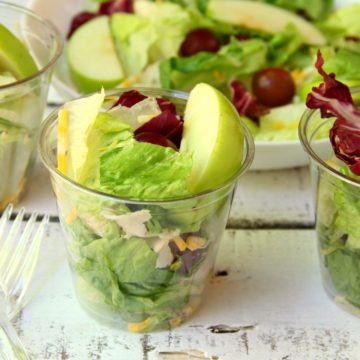 Harvest Salad to Go - A delicious combination of granny smith apples, grapes, cheese, bacon bits and more make this a perfect addition to any party menu! Serve in cups for easy and convenient eating!