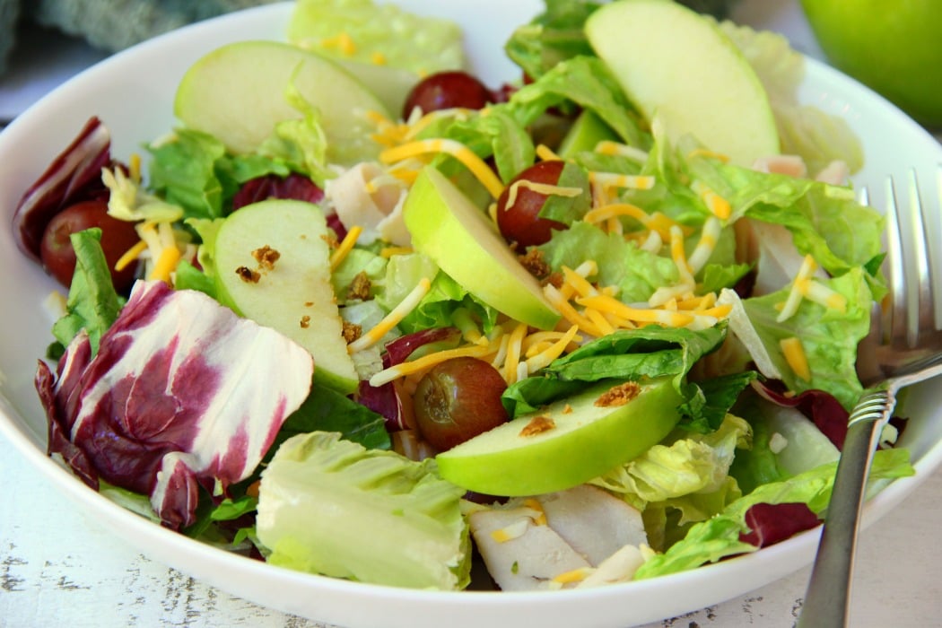 Harvest Salad to Go - A delicious combination of granny smith apples, grapes, cheese, bacon bits and more make this a perfect addition to any party menu! Serve in cups for easy and convenient eating!