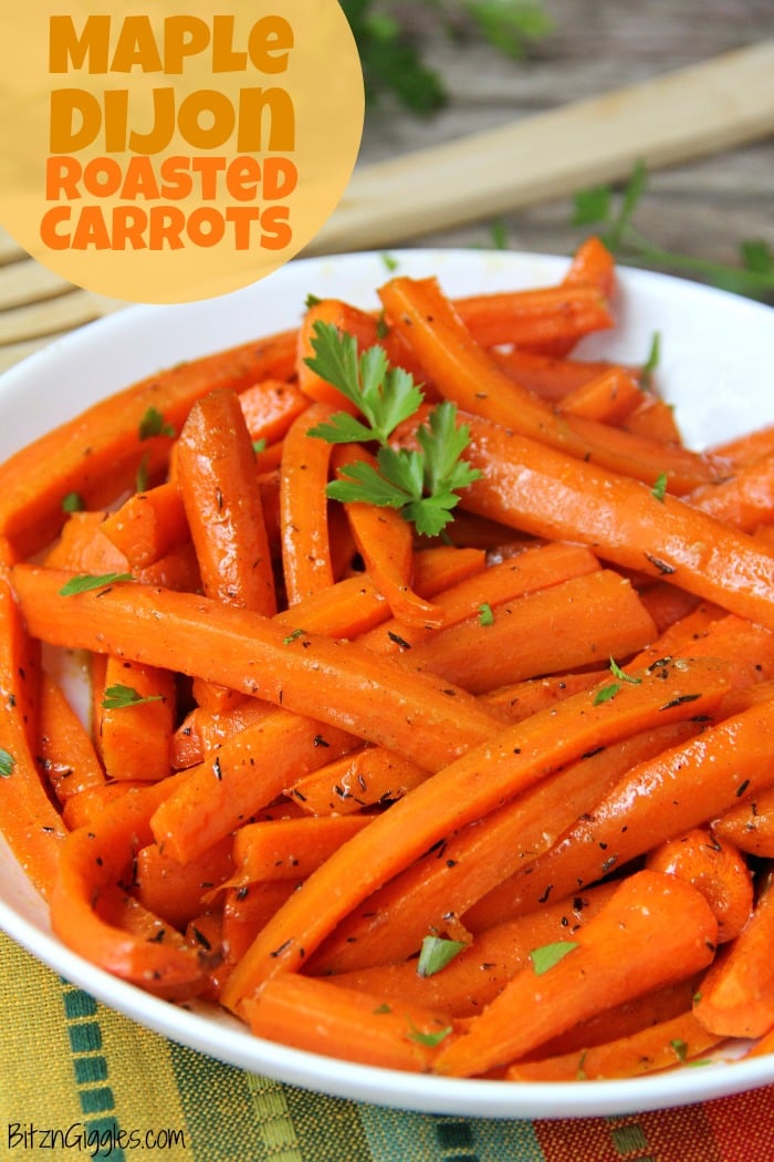 Maple Dijon Glazed Carrots - Sweet, roasted carrots with a delicious maple dijon glaze! Perfect for the holidays!