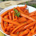 Maple Dijon Glazed Carrots - Sweet, roasted carrots with a delicious maple dijon glaze! Perfect for the holidays!