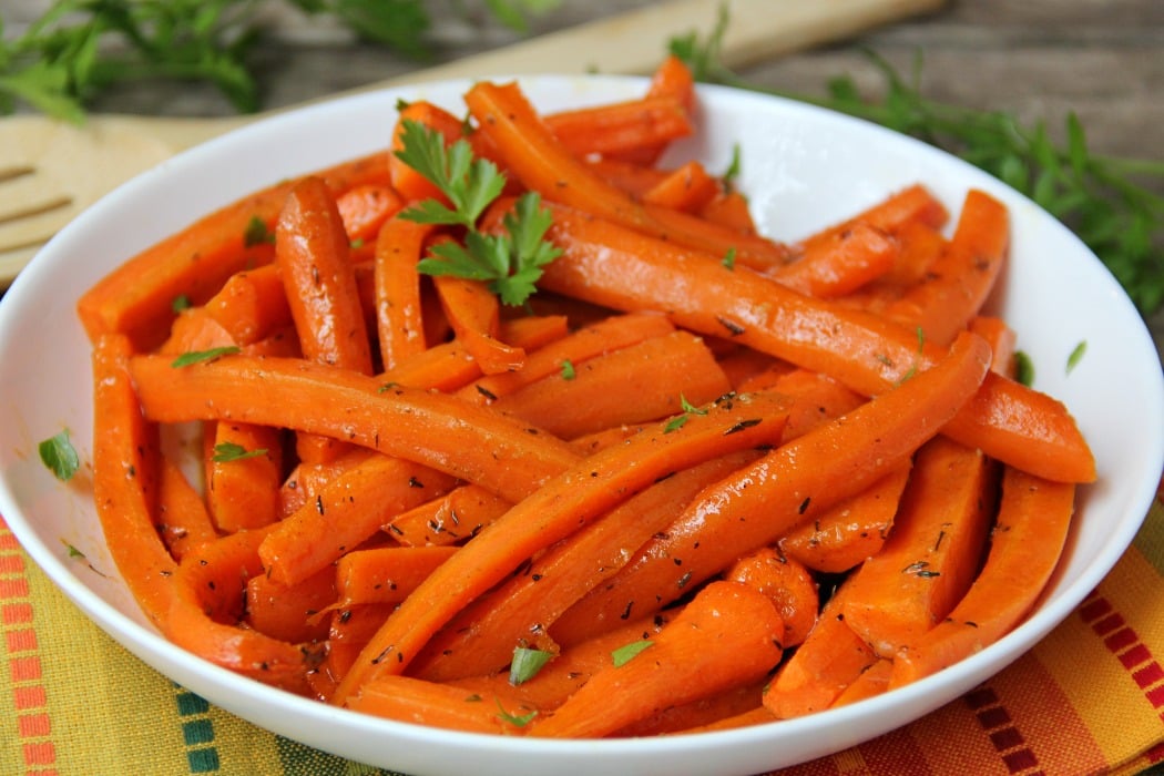 Maple Dijon Glazed Carrots - Sweet, roasted carrots with a delicious maple dijon glaze! Perfect for the holidays!