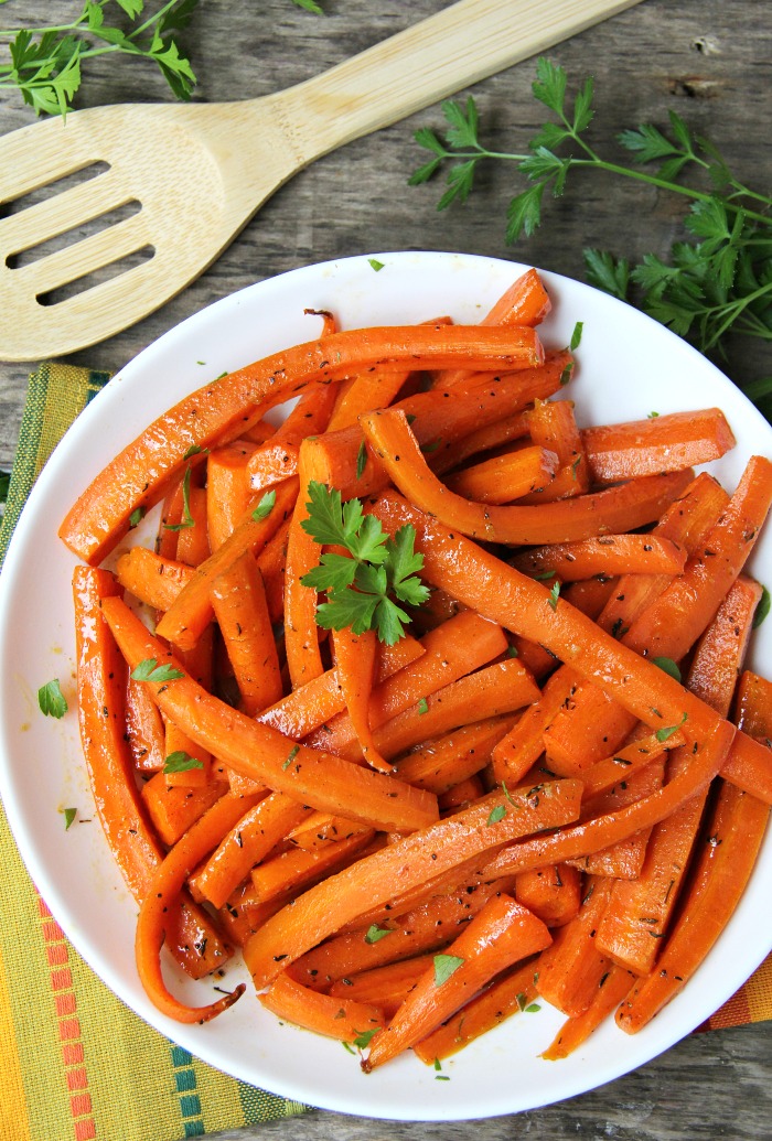 Maple Dijon Glazed Carrots - Sweet, roasted carrots with a delicious maple dijon glaze! Perfect for the holidays!