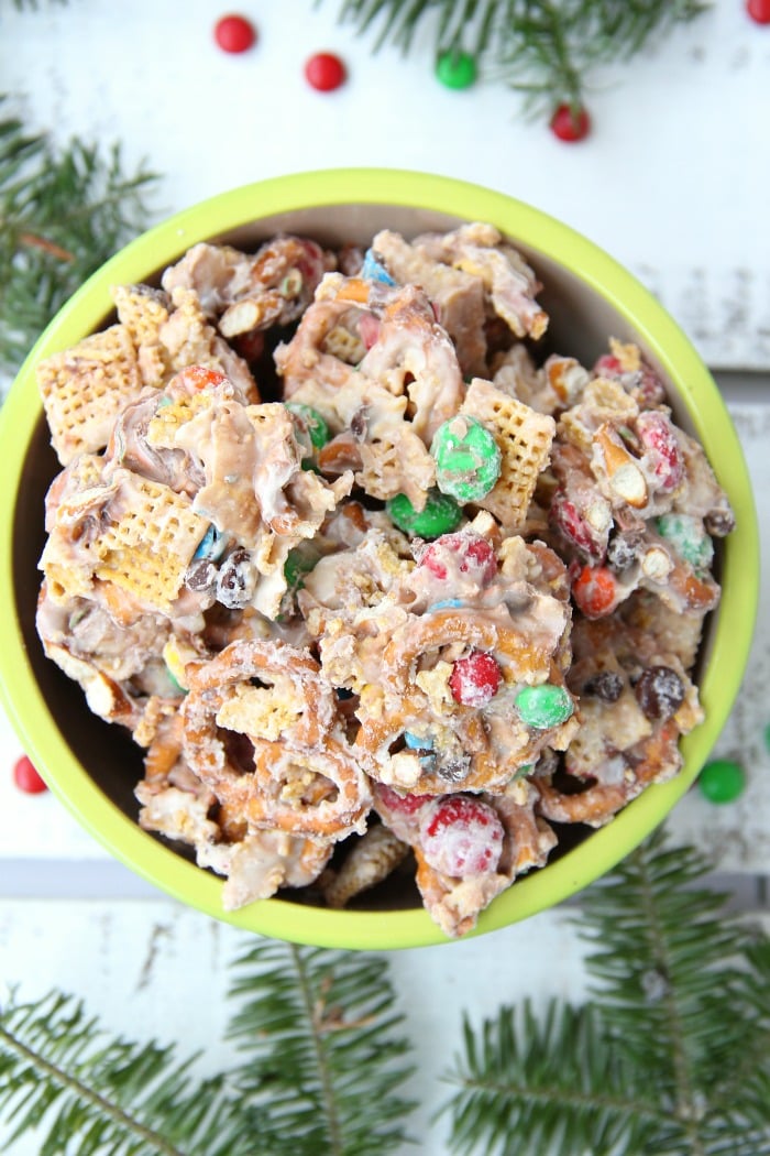 Christmas Crunch Snack Mix - An addicting combination of sweet and salty deliciousness enveloped in decadent white chocolate!