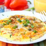 Easy Air Fryer Omelette - Prepared in the air fryer and filled with fresh veggies and cheese, this omelette is delicious and ready in 6 minutes!