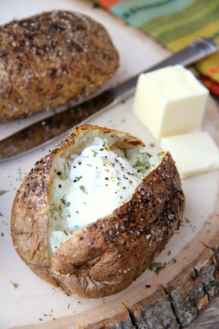 Easy Air Fryer Baked Potatoes - Tender, delicious baked potatoes with a crispy, flavorful skin.
