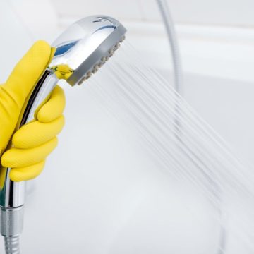 How to Clean a Shower Head - If you have a gross and grimy shower head, this simple homemade solution is sure to make it look like new again!