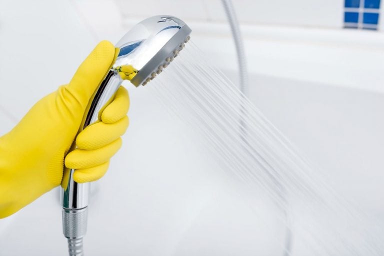 How to Clean a Shower Head - If you have a gross and grimy shower head, this simple homemade solution is sure to make it look like new again!