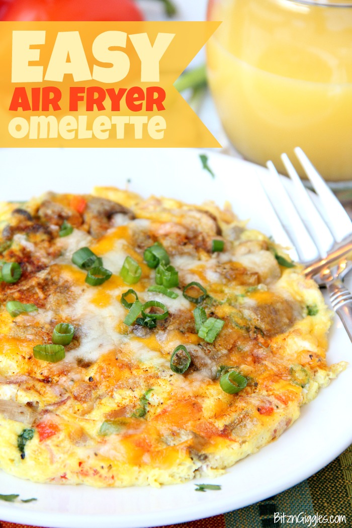 Easy Air Fryer Omelette - Prepared in the air fryer and filled with fresh veggies and cheese, this omelette is delicious and ready in 8 minutes!