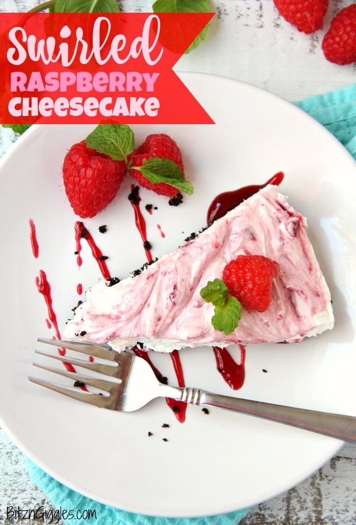 Swirled Raspberry Cheesecake -A fluffy Oreo-crust cheesecake with decadent raspberry swirls.