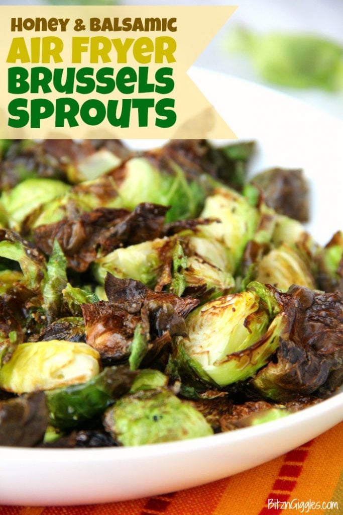 Air fried Brussels sprouts in a shallow white serving bowl.