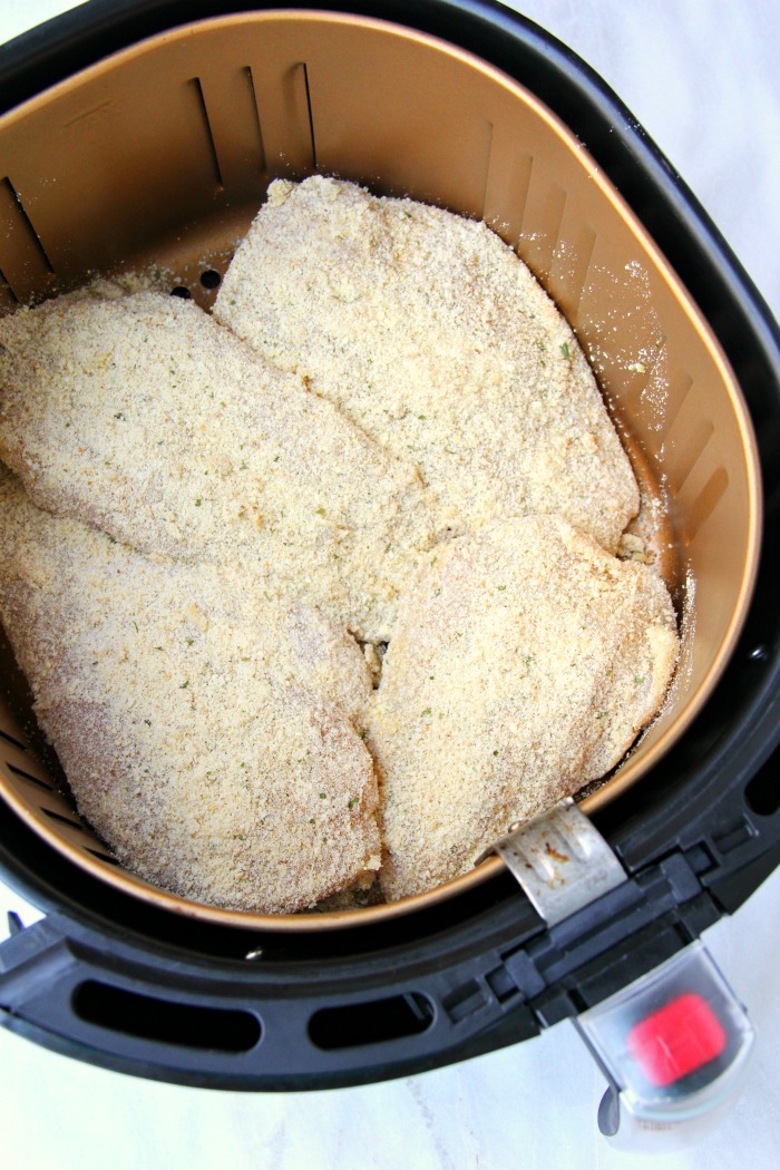 Air Fryer Parmesan Chicken - A mixture of Parmesan cheese and breadcrumbs make this chicken an easy and delicious meal the whole family will love!