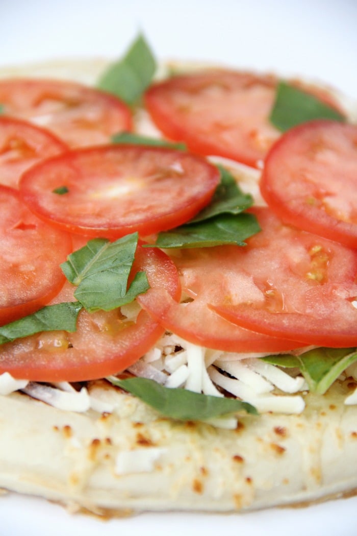 Air Fryer Pizza - Crispy and flavorful pizza baked right in the air fryer!