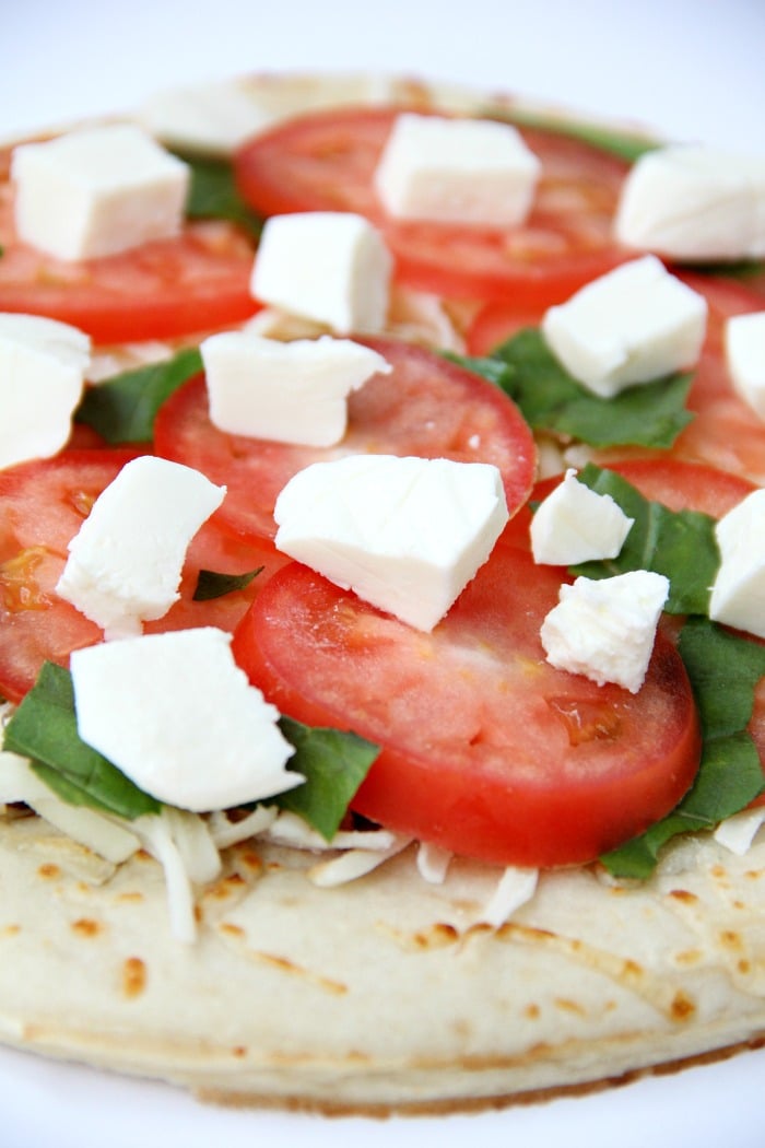 Air Fryer Pizza - Crispy and flavorful pizza baked right in the air fryer!