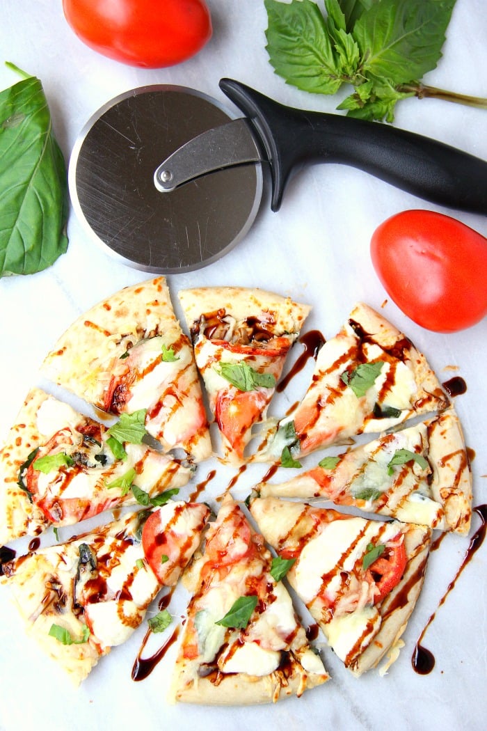 Air Fryer Pizza - Crispy and flavorful pizza baked right in the air fryer!