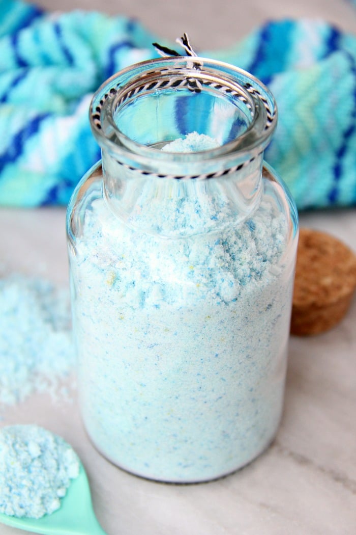 Fizzy Tropical Bath Powder - A light, airy, coconut scented powder that's calming, soothing and fizzes with pops of blue and green color when it hits the bath water, turning your water a beautiful turquoise blue.