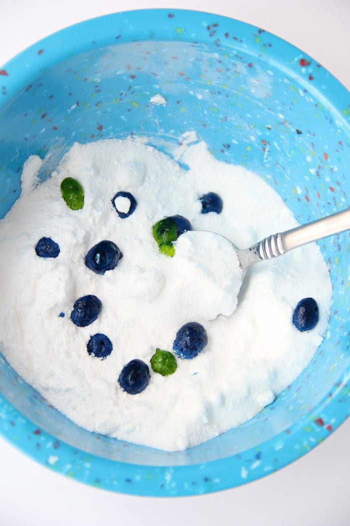 Fizzy Tropical Bath Powder - A light, airy, coconut scented powder that's calming, soothing and fizzes with pops of blue and green color when it hits the bath water, turning your water a beautiful turquoise blue.