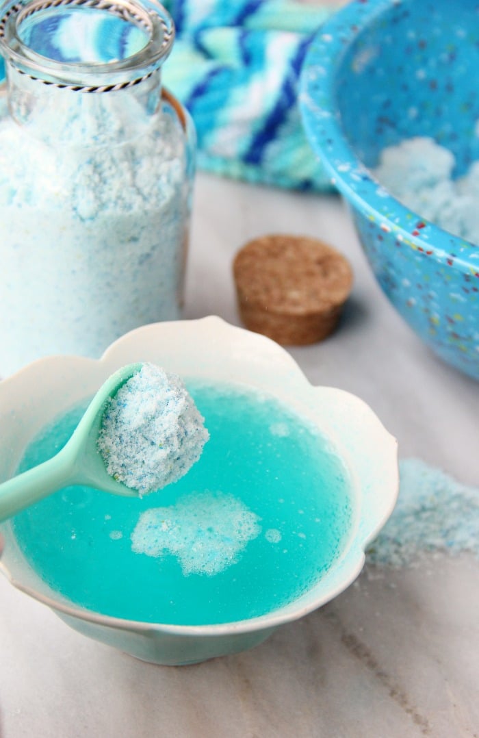 Fizzy Tropical Bath Powder - A light, airy, coconut scented powder that's calming, soothing and fizzes with pops of blue and green color when it hits the bath water, turning your water a beautiful turquoise blue.