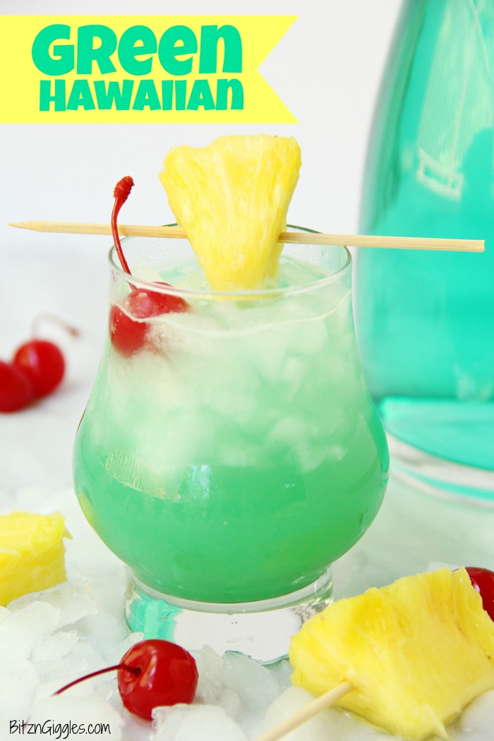 Green Hawaiian Cocktail - a beautiful and refreshing combination of vodka, coconut rum, blue curacao, pineapple juice and lemon-lime soda. It's the perfect drink for summer!