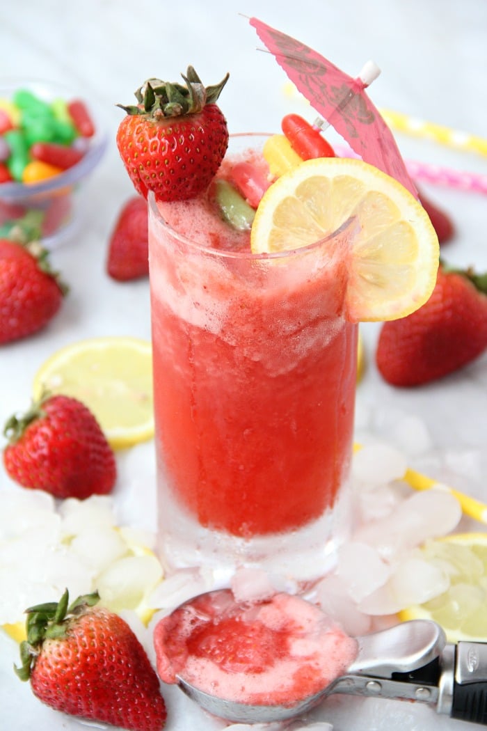 pink lemonade slush with strawberry and a lemon slice garnish