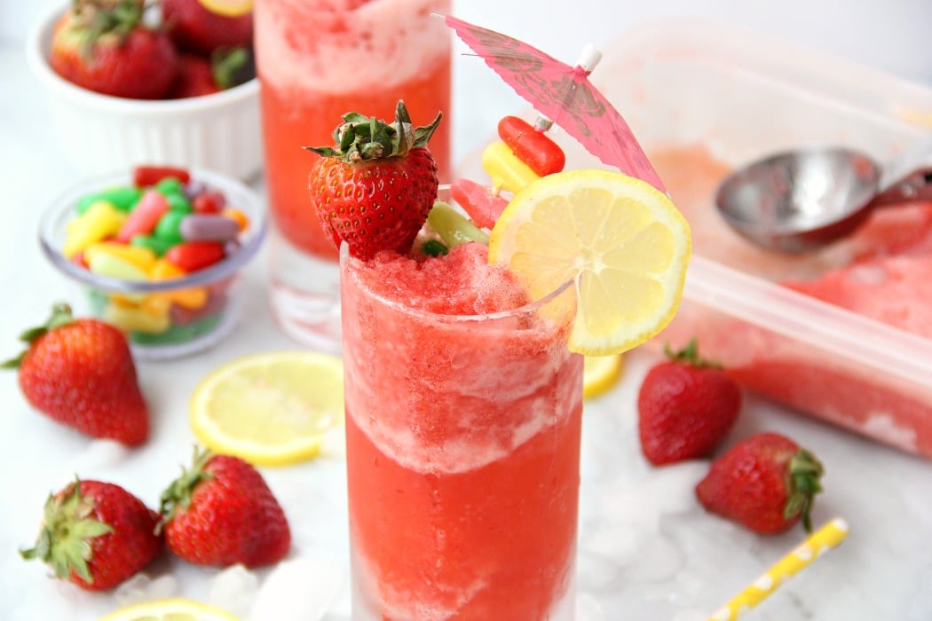 Pink Lemonade Slush - A sweet, tangy and refreshing drink perfect for family gatherings and celebrations.