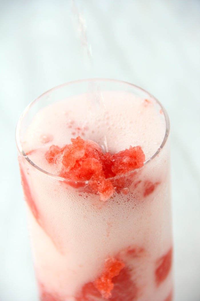 Pink Lemonade Slush - A sweet, tangy and refreshing drink perfect for family gatherings and celebrations.