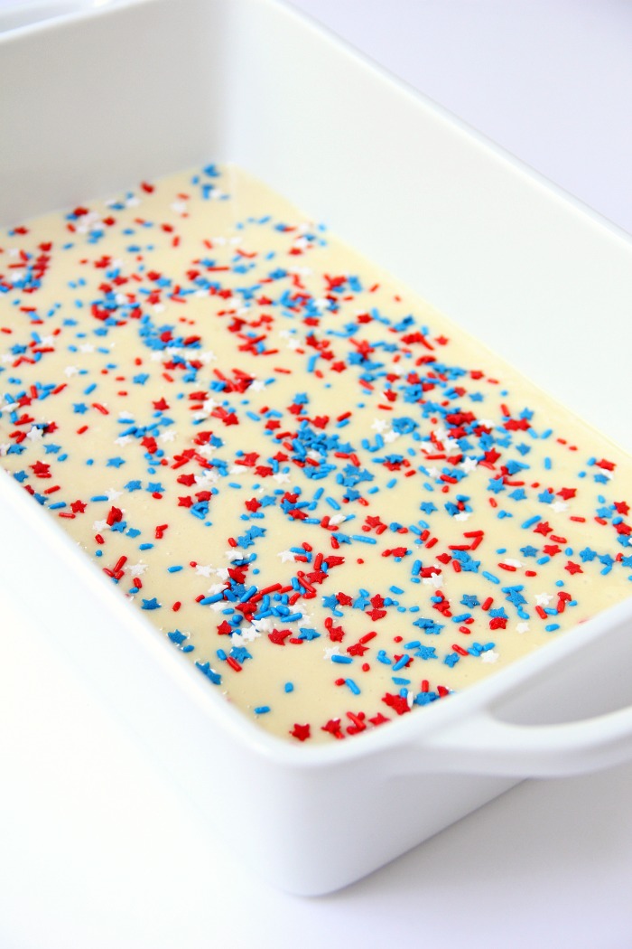 Red White & Blue Funfetti Cake - A simple DIY funfetti cake made with a box cake mix and sprinkles! So easy and perfect Memorial Day and 4th of July!