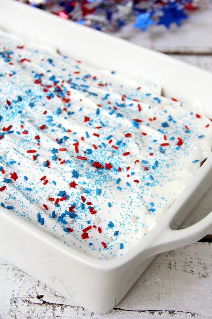 Red White & Blue Funfetti Cake - A simple DIY funfetti cake made with a box cake mix and sprinkles! So easy and perfect Memorial Day and 4th of July!