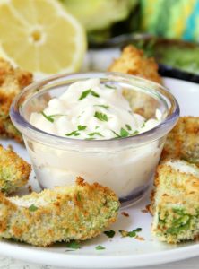 Air Fryer Avocado Wedges With Garlic Aioli Dipping Sauce - Perfectly golden and ready to eat in under 10 minutes, these crunchy avocado wedges are delicious when paired with this creamy garlic aioli dipping sauce!