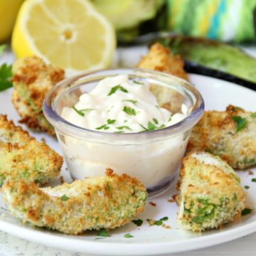 Air Fryer Avocado Wedges With Garlic Aioli Dipping Sauce - Perfectly golden and ready to eat in under 10 minutes, these crunchy avocado wedges are delicious when paired with this creamy garlic aioli dipping sauce!