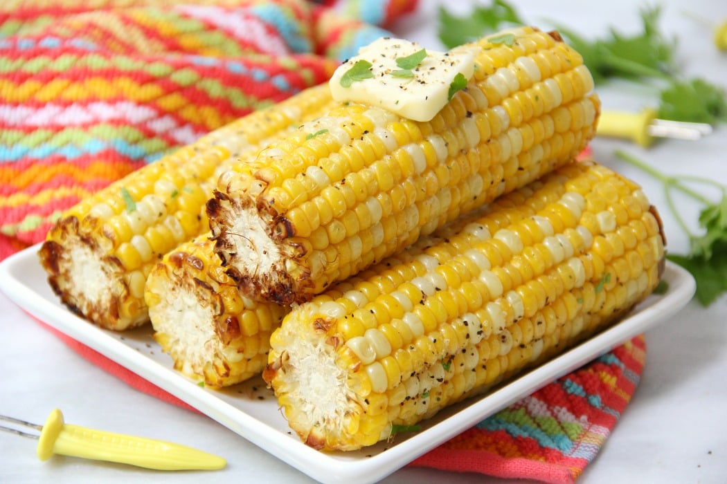 Air Fryer Corn on the Cob - Sweet and crisp corn on the cob made in the air fryer in less than 10 minutes!