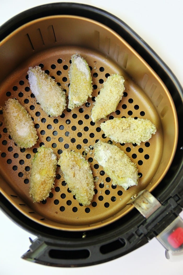 Air Fryer Avocado Wedges With Garlic Aioli Dipping Sauce - Perfectly golden and ready to eat in under 10 minutes, these crunchy avocado wedges are delicious when paired with this creamy garlic aioli dipping sauce! #airfryer #avocado #appetizer #aioli