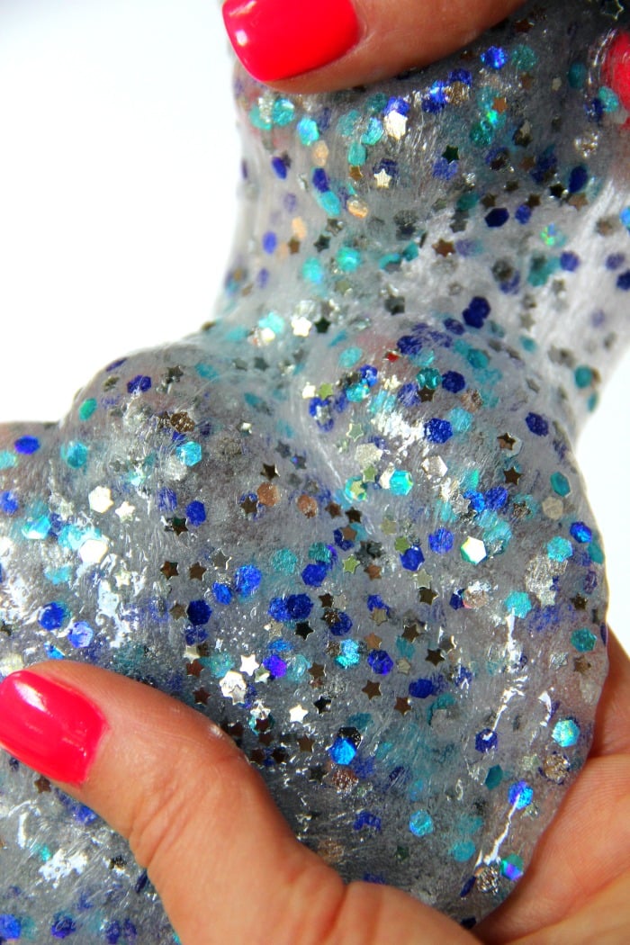 Clear Confetti Slime - Easy recipe for clear slime! Add confetti and foil stars to give it color and make it sparkle. So pretty!