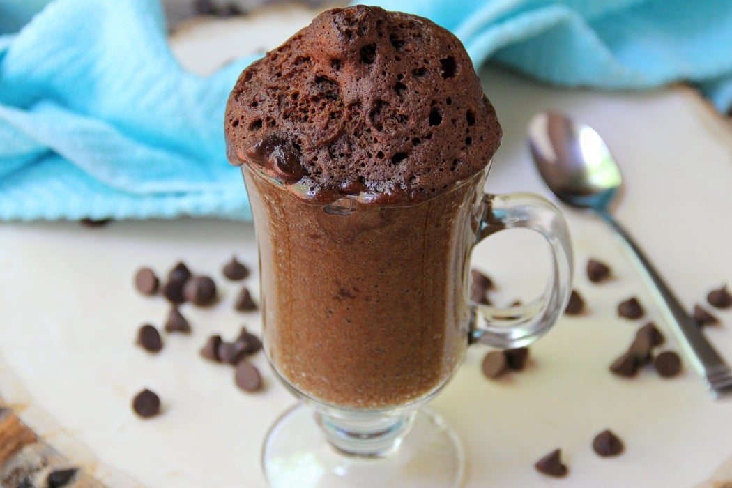 Easy Chocolate Mug Cake - Ready in 90 seconds! This mug cake is moist and delicious with melty chocolate fudge throughout!