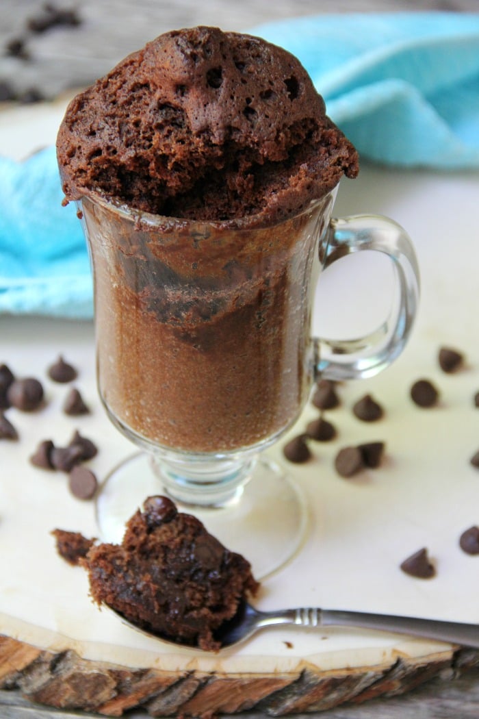 Easy Chocolate Mug Cake - Ready in 90 seconds! This mug cake is moist and delicious with melty chocolate fudge throughout!