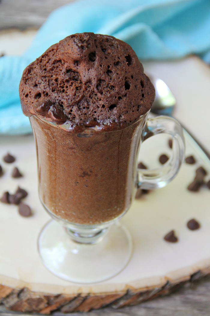 Easy Chocolate Mug Cake - Ready in 90 seconds! This mug cake is moist and delicious with melty chocolate fudge throughout!