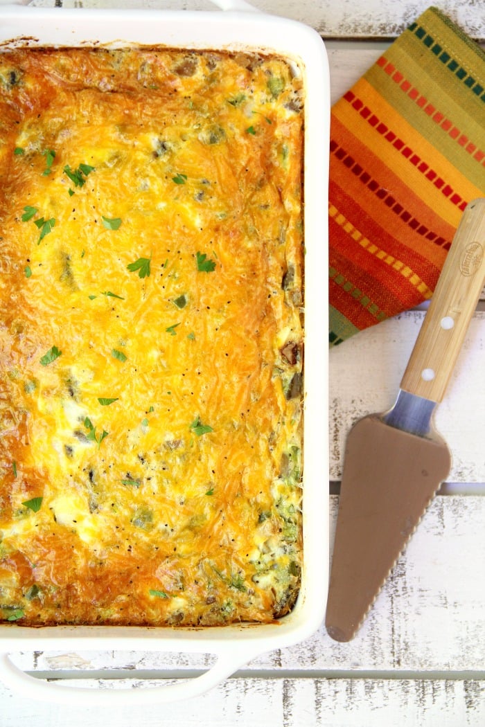 Ultimate Oven Omelette - This breakfast oven omelette is filled with veggies, ham and cheese and baked in the oven. Perfect for a party crowd!